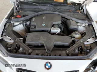 2016 BMW 2 Series 228i with VIN WBA1K9C53GV710823, listed as a Copart auction lot 84087434 with 70,822 mi miles and Salvage Title. Bid and sale history available at carsss.com. Image 11.