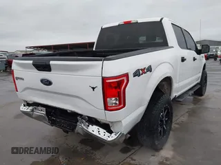 2015 Ford F-150 XLT with VIN 1FTEW1EP7FKE61564, listed as a IAAI auction lot 41889545 with 152,057 mi miles. Bid and sale history available at carsss.com. Image 4.