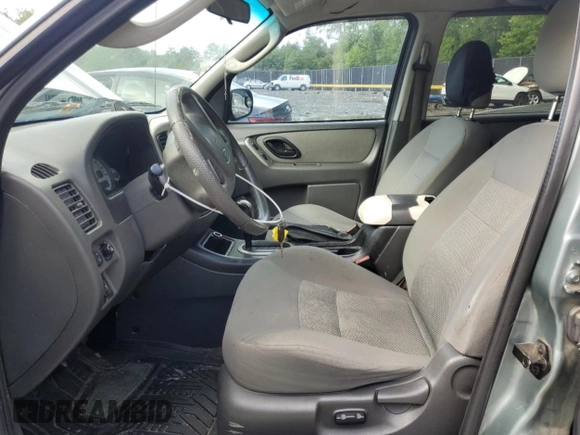 2006 Ford Escape XLT with VIN 1FMYU93146KC00081, listed as a Copart auction lot 56724835 with 243,213 mi miles and Salvage title. Bid and sale history available at DreamBid. Image 7.