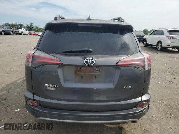 2018 Toyota RAV4 XLE with VIN JTMWFREV2JD125190, listed as a Copart auction lot 60484965 with Not provided miles and Salvage title. Bid and sale history available at DreamBid. Image 6.