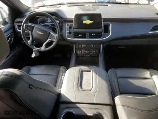 2023 Chevrolet Suburban Premier with VIN 1GNSCFKD5PR394675, listed as a Copart auction lot 49641395 with 56,946 mi miles and Salvage Title. Bid and sale history available at carsss.com. Image 8.
