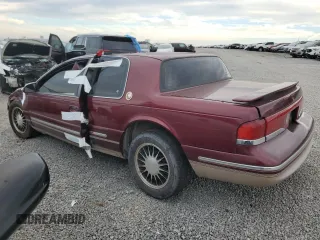 1997 Mercury Cougar z VIN 1MELM62W6VH615553, wystawiony jako Copart lot #81075294 z przebiegiem 149 215 mil mil oraz Szkody całkowita. Historia ofert i sprzedaży dostępna na DreamBid. Obrazek 2.