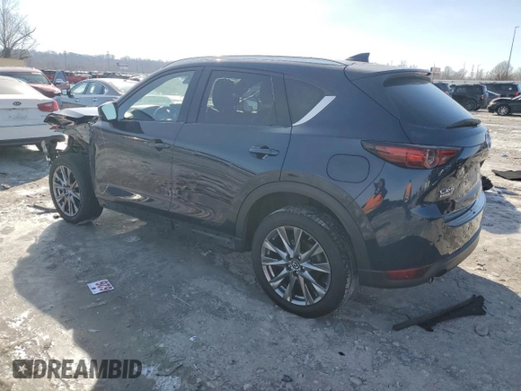 2021 Mazda CX-5 Signature with VIN JM3KFBEY0M0410019, listed as a Copart auction lot 89194805 with 41,489 mi miles and Salvage Title. Bid and sale history available at carsss.com. Image 2.