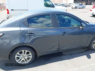 2016 Scion iA z VIN 3MYDLBZV5GY113222, wystawiony jako IAAI lot #42076460 z przebiegiem 112 249 mil mil oraz . Historia ofert i sprzedaży dostępna na DreamBid. Obrazek 17.
