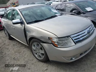 2009 Ford Taurus Limited z VIN 1FAHP25W19G123694, wystawiony jako IAAI lot #41802545 z przebiegiem 140 576 mil mil oraz . Historia ofert i sprzedaży dostępna na DreamBid. Obrazek 1.