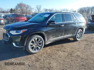 2018 Chevrolet Traverse Premier z VIN 1GNEVJKW5JJ174261, wystawiony jako IAAI lot #41656906 z przebiegiem 101 908 mil mil oraz . Historia ofert i sprzedaży dostępna na DreamBid. Obrazek 20.