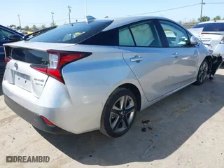 2022 Toyota Prius L Eco with VIN JTDKAMFU3N3190048, listed as a IAAI auction lot 41982252 with 19,189 mi miles. Bid and sale history available at carsss.com. Image 4.