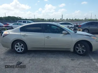 2009 Nissan Altima S with VIN 1N4AL21E59N544078, listed as a IAAI auction lot 41948389 with 149,484 mi miles and . Bid and sale history available at DreamBid. Image 13.