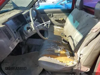 1987 Nissan Hardbody E z VIN JN6ND11S3HW006235, wystawiony jako Copart lot #78528914 z przebiegiem 298 079 mil mil oraz Szkody całkowita. Historia ofert i sprzedaży dostępna na DreamBid. Obrazek 7.