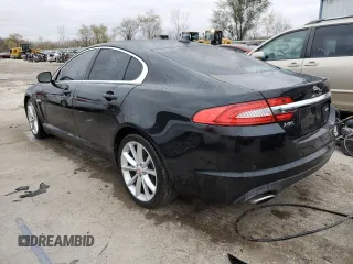 2015 Jaguar XF V6 Portfolio with VIN SAJWA0F78F8U87018, listed as a Copart auction lot 79106944 with 108,752 mi miles and Salvage Title. Bid and sale history available at carsss.com. Image 2.