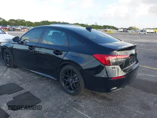 2022 Honda Civic Sport z VIN 2HGFE2F53NH569990, wystawiony jako IAAI lot #41944635 z przebiegiem 20 935 mil mil oraz . Historia ofert i sprzedaży dostępna na DreamBid. Obrazek 3.