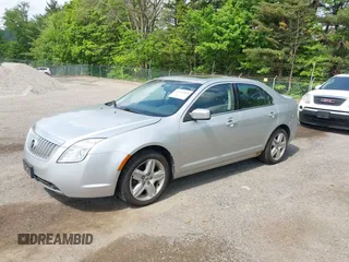 2011 Mercury Milan z VIN 3MEHM0HA5BR602401, wystawiony jako IAAI lot #42287369 z przebiegiem 100 139 mil mil oraz . Historia ofert i sprzedaży dostępna na DreamBid. Obrazek 2.