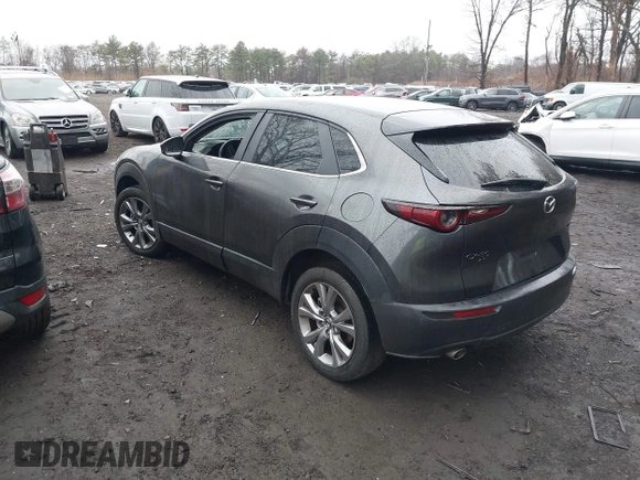 2021 Mazda CX-30 Select with VIN 3MVDMBBL2MM312752, listed as a IAAI auction lot 41933342 with 52,213 mi miles and . Bid and sale history available at DreamBid. Image 3.