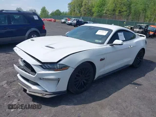 2021 Ford Mustang GT with VIN 1FA6P8CF6M5137253, listed as a IAAI auction lot 42224111 with 51,168 mi miles and . Bid and sale history available at DreamBid. Image 2.