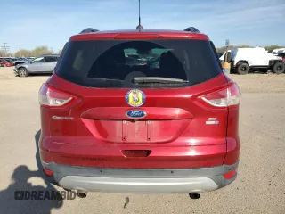 2016 Ford Escape SE with VIN 1FMCU9GX0GUA96770, listed as a Copart auction lot 52564135 with 73,727 mi miles and Salvage Title. Bid and sale history available at carsss.com. Image 6.