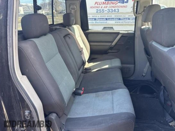 2004 Nissan Titan LE with VIN 1N6AA07A84N590583, listed as a Copart auction lot 49112705 with 92,426 mi miles and Salvage Title. Bid and sale history available at DreamBid. Image 6.