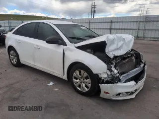 2015 Chevrolet Cruze LS z VIN 1G1PA5SHXF7151982, wystawiony jako Copart lot #54797185 z przebiegiem 137 278 mil mil oraz Szkoda całkowita • Salvage title. Historia ofert i sprzedaży dostępna na DreamBid. Obrazek 13.