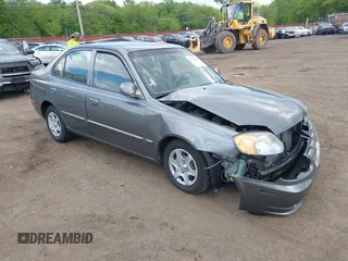 2004 Hyundai Accent GL with VIN KMHCG45C84U514658, listed as a IAAI auction lot 42222115 with 33,055 mi miles and . Bid and sale history available at DreamBid. Image 1.