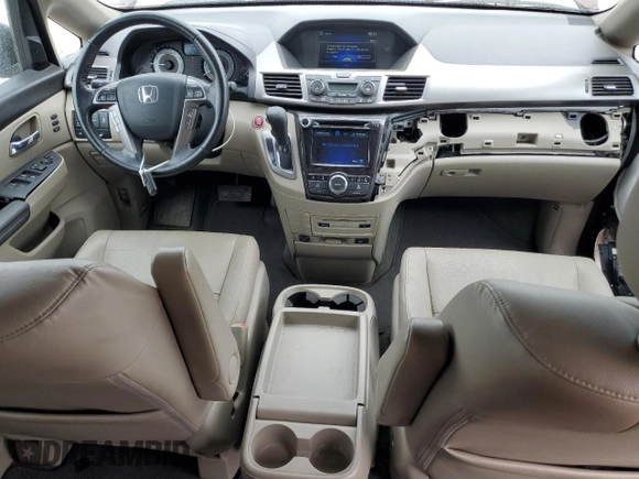 2016 Honda Odyssey Touring Elite with VIN 5FNRL5H96GB125546, listed as a Copart auction lot 54954165 with 101,479 mi miles and Salvage Title. Bid and sale history available at DreamBid. Image 8.