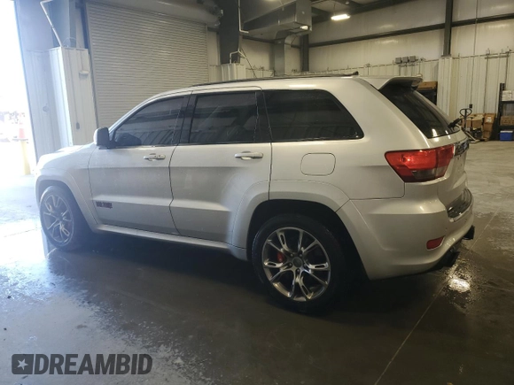 2012 Jeep Grand Cherokee SRT8 with VIN 1C4RJFDJ2CC105829, listed as a Copart auction lot 51840385 with 142,146 mi miles and Clean Title. Bid and sale history available at carsss.com. Image 2.