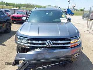 2019 Volkswagen Atlas SEL z VIN 1V2ER2CA5KC555568, wystawiony jako IAAI lot #42050516 z przebiegiem 71 599 mil mil oraz . Historia ofert i sprzedaży dostępna na DreamBid. Obrazek 12.