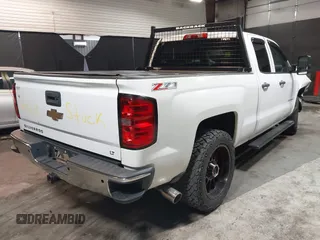 2014 Chevrolet Silverado 1500 LT with VIN 1GCVKREC0EZ116146, listed as a IAAI auction lot 41948629 with 84,777 mi miles. Bid and sale history available at carsss.com. Image 4.