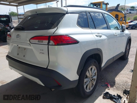 2022 Toyota Corolla Cross LE z VIN 7MUCAABG3NV030906, wystawiony jako IAAI lot #42475640 z przebiegiem 119 135 mil mil oraz . Historia ofert i sprzedaży dostępna na DreamBid. Obrazek 4.