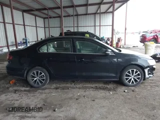 2018 Volkswagen Jetta SE with VIN 3VWDB7AJ3JM214858, listed as a IAAI auction lot 42151137 with 100,346 mi miles and . Bid and sale history available at DreamBid. Image 14.