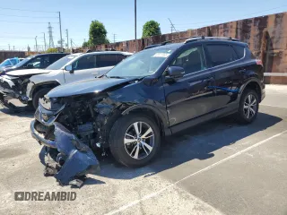 2018 Toyota RAV4 XLE with VIN JTMRFREV1JJ252673, listed as a Copart auction lot 63811565 with 91,511 mi miles and Salvage title. Bid and sale history available at DreamBid. Image 1.