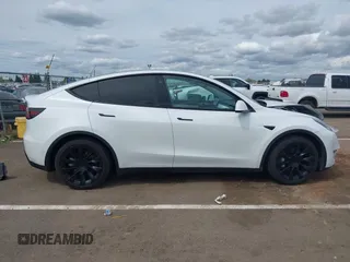 2022 Tesla Model Y Long Range with VIN 7SAYGDEE2NF403354, listed as a IAAI auction lot 41986216 with 53,177 mi miles and . Bid and sale history available at DreamBid. Image 13.