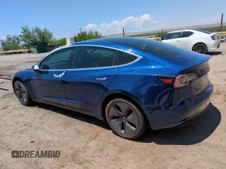 2018 Tesla Model 3 Long Range Battery z VIN 5YJ3E1EBXJF146469, wystawiony jako Copart lot #60101515 z przebiegiem 131 507 mil mil oraz Czysty tytuł • Clean title. Historia ofert i sprzedaży dostępna na DreamBid. Obrazek 2.