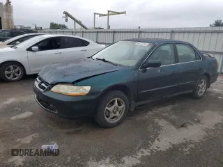 1999 Honda Accord LX z VIN 1HGCG5541XA106321, wystawiony jako Copart lot #66372794 z przebiegiem 303 209 mil mil oraz Szkoda całkowita • Salvage title. Historia ofert i sprzedaży dostępna na DreamBid. Obrazek 1.