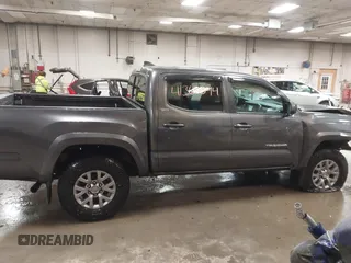 2017 Toyota Tacoma SR5 with VIN 3TMCZ5AN0HM066891, listed as a IAAI auction lot 41367044 with 130,351 mi miles and . Bid and sale history available at DreamBid. Image 14.