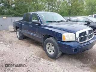 2006 Dodge Dakota SLT z VIN 1D7HW48J66S514184, wystawiony jako IAAI lot #42270964 z przebiegiem 105 857 mil mil oraz . Historia ofert i sprzedaży dostępna na DreamBid. Obrazek 1.