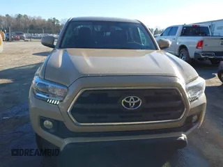 2017 Toyota Tacoma SR5 with VIN 3TMCZ5ANXHM088347, listed as a IAAI auction lot 41591318 with 103,800 mi miles and . Bid and sale history available at DreamBid. Image 12.