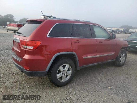2011 Jeep Grand Cherokee Laredo with VIN 1J4RS4GG6BC704212, listed as a Copart auction lot 83753234 with 200,104 mi miles and Salvage Title. Bid and sale history available at DreamBid. Image 3.