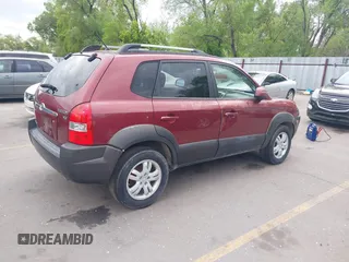 2006 Hyundai Tucson GLS with VIN KM8JN12D86U340196, listed as a IAAI auction lot 42144736 with 232,121 mi miles. Bid and sale history available at carsss.com. Image 4.