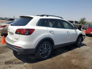 2015 Mazda CX-9 Grand Touring with VIN JM3TB3DA7F0454094, listed as a Copart auction lot 61757035 with 56,997 mi miles and Salvage title. Bid and sale history available at DreamBid. Image 3.