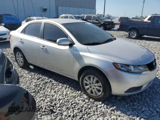 2010 Kia Forte LX with VIN KNAFT4A23A5107621, listed as a Copart auction lot 53696985 with 124,833 mi miles and Salvage Title. Bid and sale history available at carsss.com. Image 4.