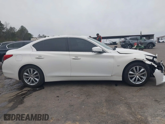 2015 Infiniti Q50 Premium z VIN JN1BV7AP9FM331131, wystawiony jako IAAI lot #41786108 z przebiegiem 176 874 mil mil oraz . Historia ofert i sprzedaży dostępna na DreamBid. Obrazek 13.