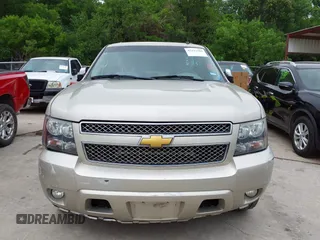 2013 Chevrolet Suburban LT with VIN 1GNSKJE74DR166223, listed as a IAAI auction lot 42172184 with 200,901 mi miles and . Bid and sale history available at DreamBid. Image 12.