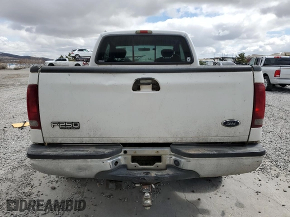 2003 Ford Super Duty F-250 XL with VIN 1FTNX21F03EB11672, listed as a Copart auction lot 51553485 with 382,272 mi miles and Salvage Title. Bid and sale history available at carsss.com. Image 6.