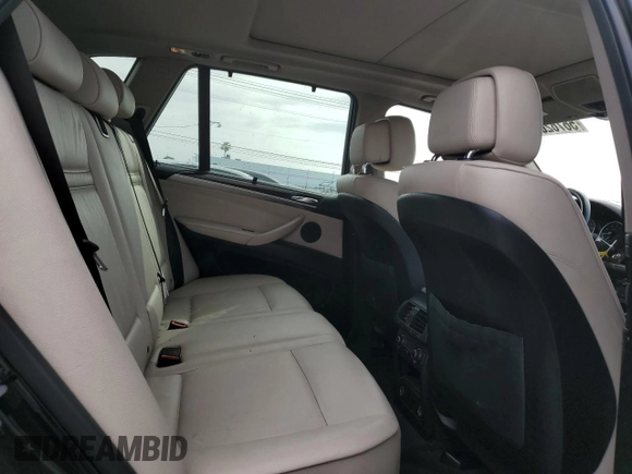 2012 BMW X5 35i z VIN 5UXZV4C51CL989449, wystawiony jako Copart lot #56762095 z przebiegiem 112 576 mil mil oraz Szkoda całkowita • Salvage title. Historia ofert i sprzedaży dostępna na DreamBid. Obrazek 11.