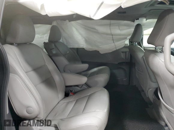 2015 Toyota Sienna XLE с VIN 5TDYK3DC9FS601304, выставлен на аукционе Copart как лот 51118295 с пробегом 153 121 миль миль и Списание • Salvage title. История ставок и продаж доступна на DreamBid. Изображение 11.