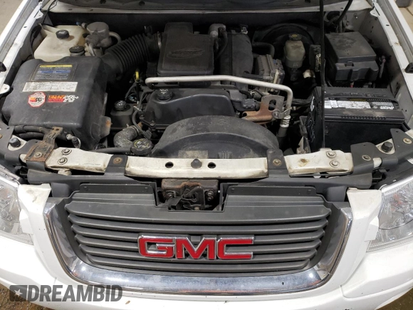 2005 GMC Envoy SLE z VIN 1GKDT13S452360609, wystawiony jako Copart lot #56188495 z przebiegiem 180 046 mil mil oraz Szkoda całkowita • Salvage title. Historia ofert i sprzedaży dostępna na DreamBid. Obrazek 12.