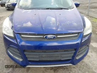 2014 Ford Escape SE z VIN 1FMCU9G91EUA06332, wystawiony jako IAAI lot #42727426 z przebiegiem 173 713 mil mil oraz . Historia ofert i sprzedaży dostępna na DreamBid. Obrazek 6.