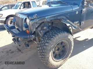 2008 Jeep Wrangler Sahara with VIN 1J4FA54108L543764, listed as a IAAI auction lot 41867734 with 186,145 mi miles and . Bid and sale history available at DreamBid. Image 6.
