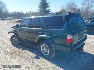 2001 Toyota 4Runner SR5 with VIN JT3HN86R310335526, listed as a IAAI auction lot 41288058 with 202,219 mi miles. Bid and sale history available at carsss.com. Image 3.