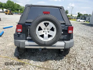 2008 Jeep Wrangler Unlimited Sahara with VIN 1J4GA59178L607960, listed as a Copart auction lot 57855995 with 122,913 mi miles and Salvage title. Bid and sale history available at DreamBid. Image 6.