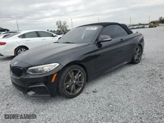2015 BMW 2 Series M235i with VIN WBA1M1C54FV393578, listed as a Copart auction lot 88945735 with 95,713 mi miles and Salvage Title. Bid and sale history available at carsss.com. Image 1.